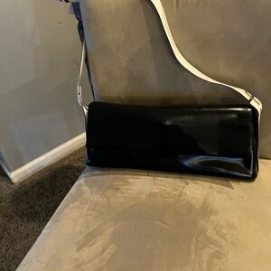 Details’ version of a classic spectator shoulder bag with doesn’t disappoint